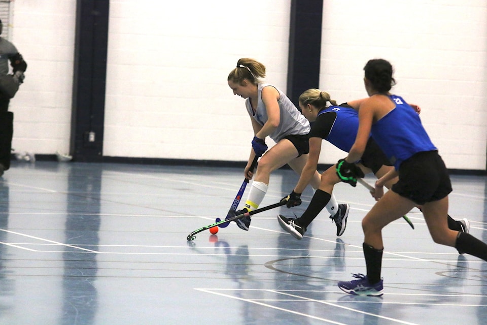 Caitlin Erickson of the Island Team carries the ball  during the 2025 Field Hockey B.C. Senior Indoor Championships at the Cowichan Community Centre on Sunday, Feb. 2. 