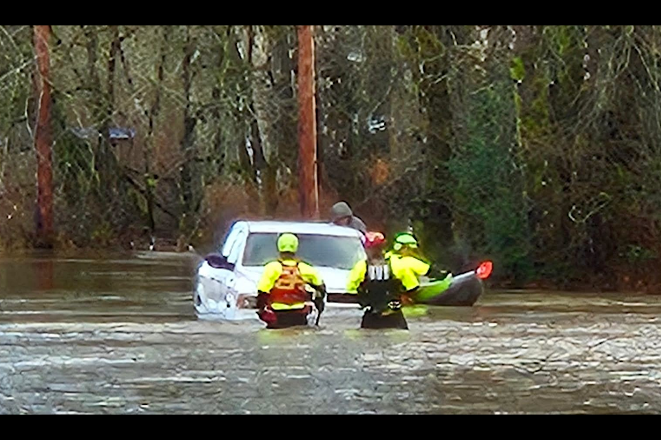 Cowichan Search & Rescue were called out on Dec 18 to assist with a man stranded with his vehicle in flood waters on Cowichan Bay Road. (CSAR photo)