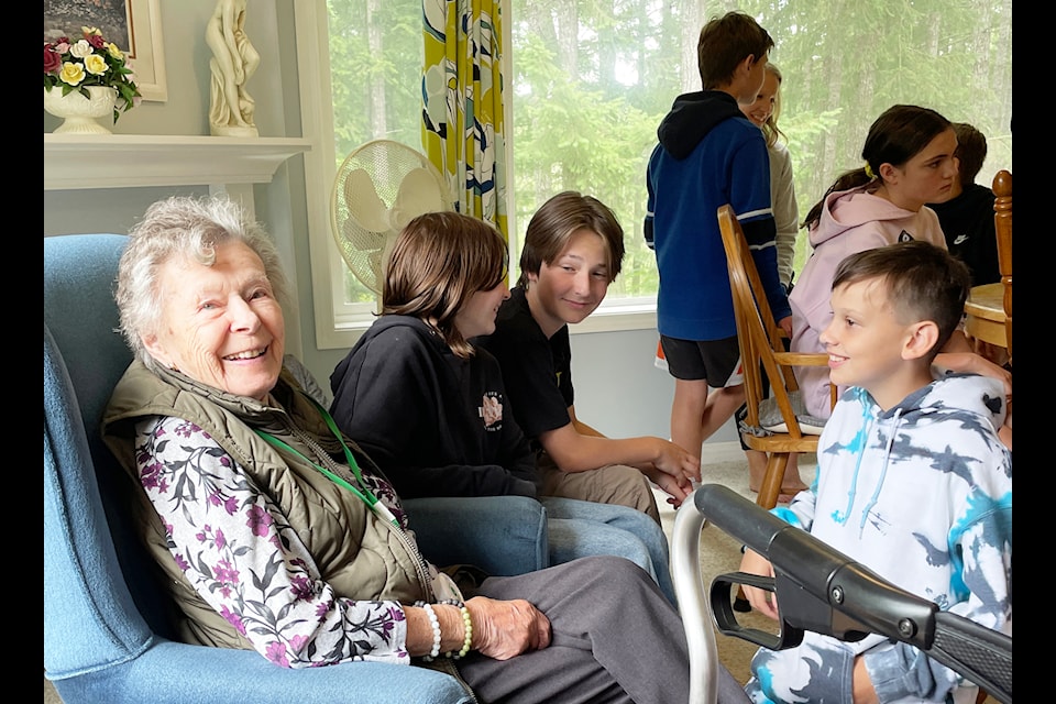 Betty entertains students from Maple Bay Elementary during their final visit of the year.