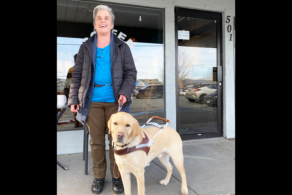 Mitch Kidd who has had retinopathy of prematurity (ROP) and been legally blind since birth poses with his guide dog Mario outside of Coffee on the Moon in Duncan.
(Chadd Cawson/Citizen)

