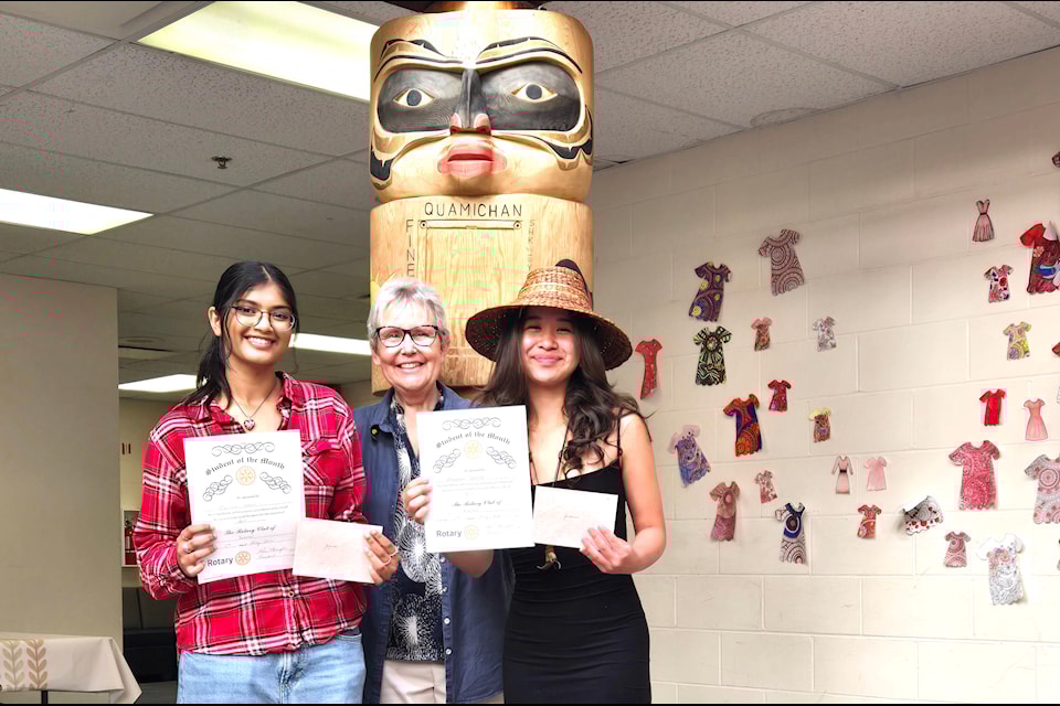 The Rotary Club of Duncan president Karen Thorington presented the April Student of the Month Award to Jigisha Saani and Jordanna Doolan from Quamichan School in Duncan.