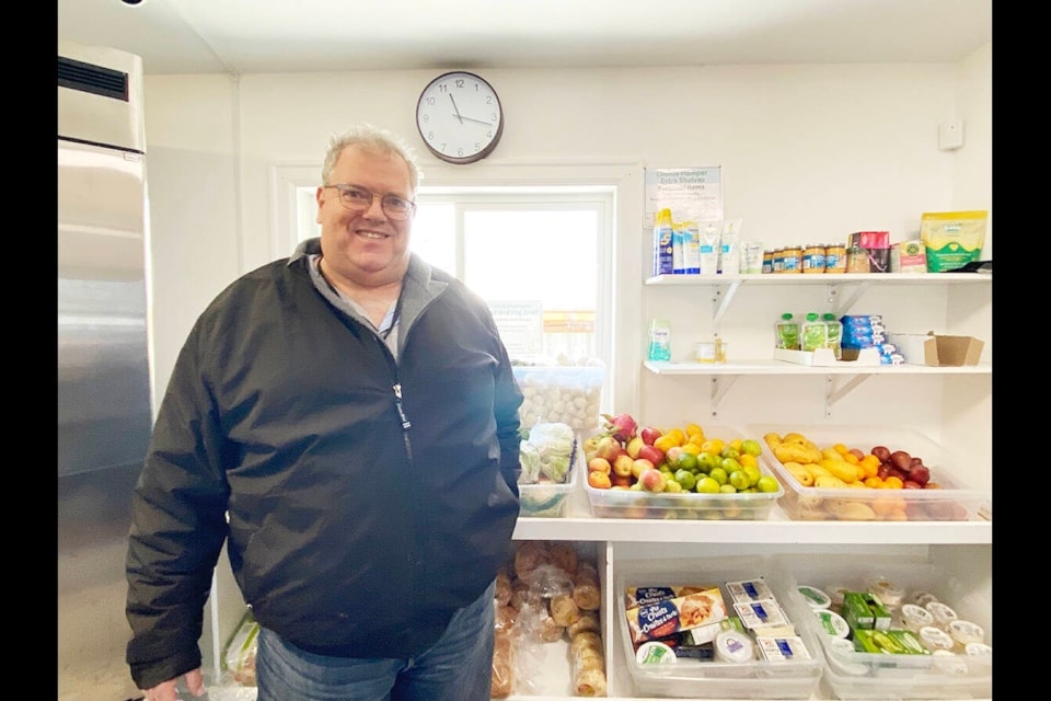 Cowichan Valley Basket Society manager Henry Wikkerink stands in front of a wide selection of fruits and vegetables, and other healthy options. CVBS, which is open six days a week and located on Garden Street in Duncan, is looking for the support of the community to help finance a new project to assist in the rising numbers of food insecurity seen here in the valley.