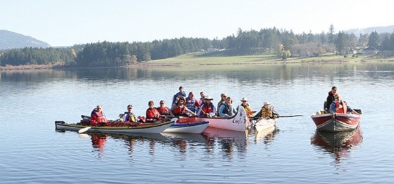 29157cowichanvalleycitizenSomenosLakeflotillaofcanoes.cmyk_.lb