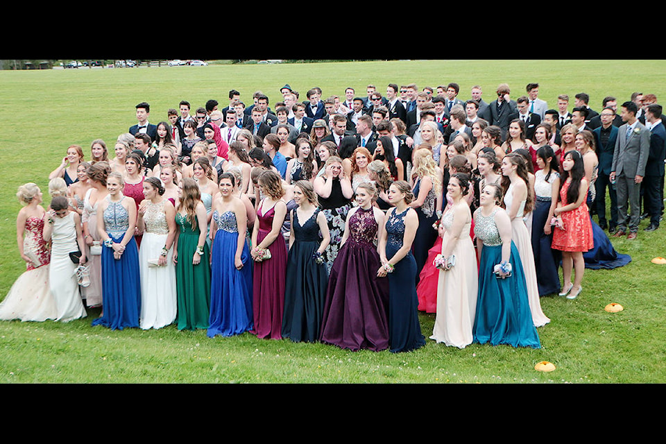 Frances Kelsey graduates pose for a photo in their finery on the weekend. (Kevin Rothbauer/Citizen)