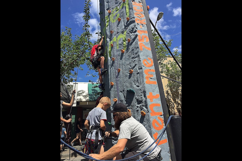 Rock climbing was available in downtown thanks to a temporary wall. (Kevin Rothbauer/Citizen)