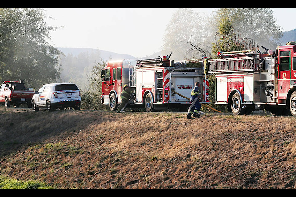 North Cowichan’s South End firefighters respond to a blaze on the dike on Beverly Street in Duncan. (Sarah Simpson/Citizen)
