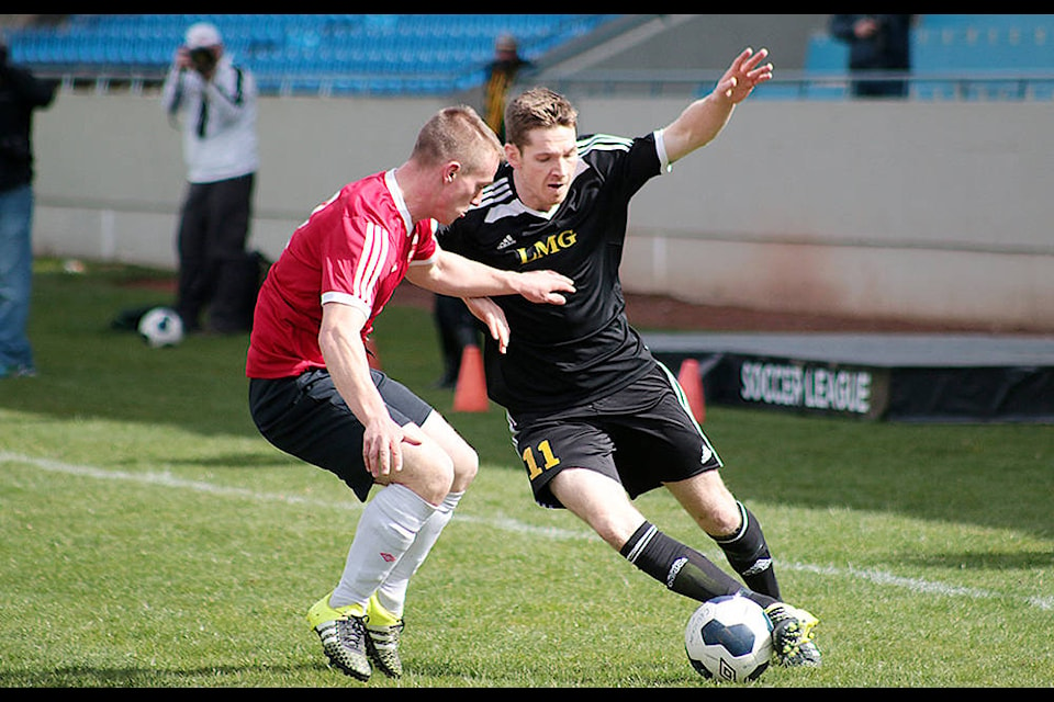 Cowichan LMG’s Dan Cato battles for the ball early in the first half of the Jackson Cup final at Victoria’s Royal Athletic Park in April. (Kevin Rothbauer/Citizen)