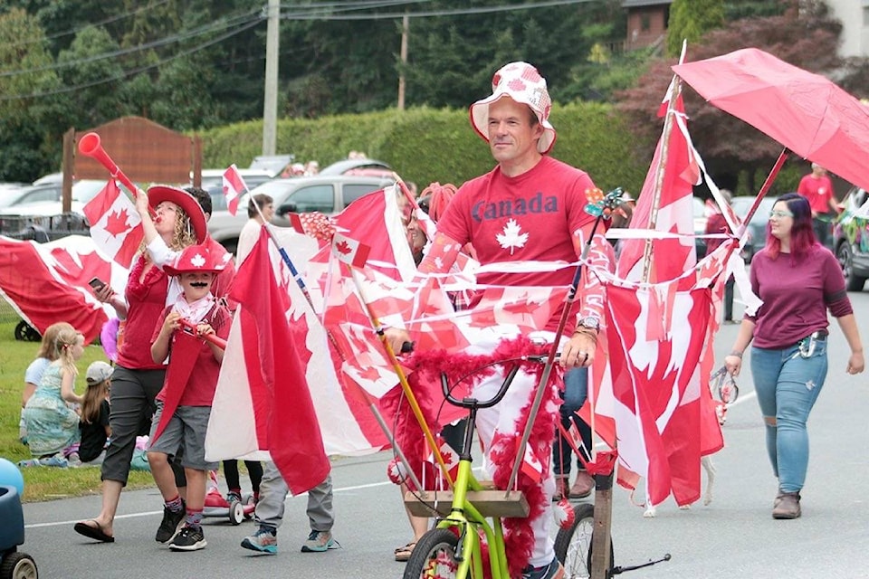 The theme was agriculture but it was a sea of red, white and maple leafs at the annual Maple Bay Parade on Canada Day. (Kevin Rothbauer/Citizen)