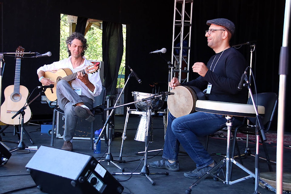Itamar Erez and Hamin Honari perform on the Islands Stage at the Islands Folk Festival on July 21. (Lexi Bainas/Citizen)