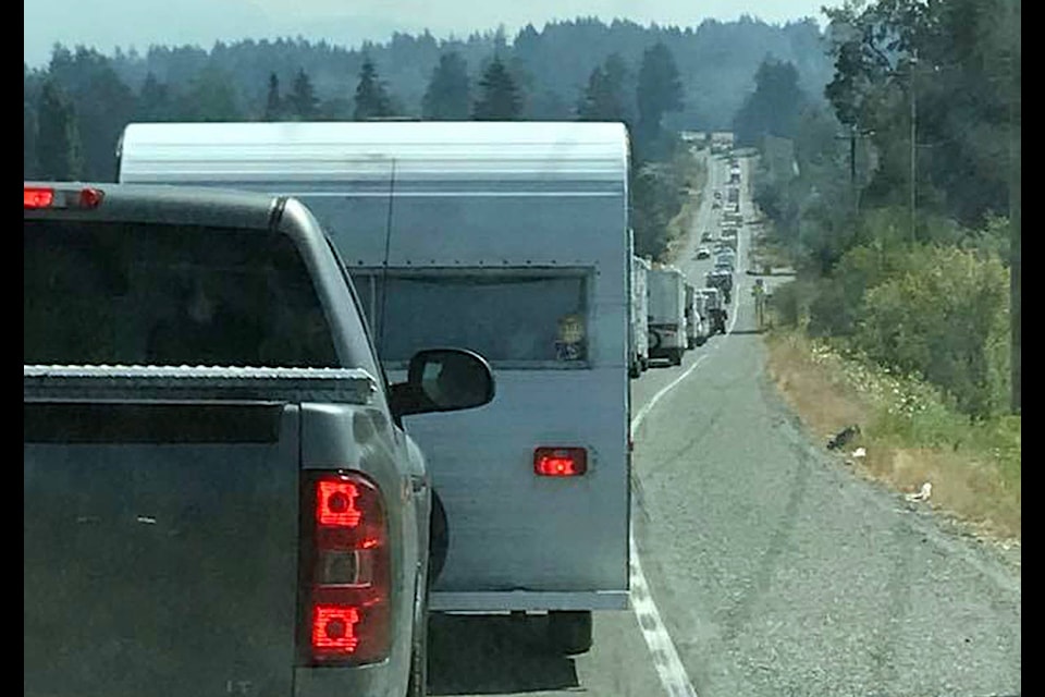 Traffic lined up for miles along Highway 18 as everyone tries to get home from their Sunfest weekend in Lake Cowichan. (Laurie Johnson photo)
