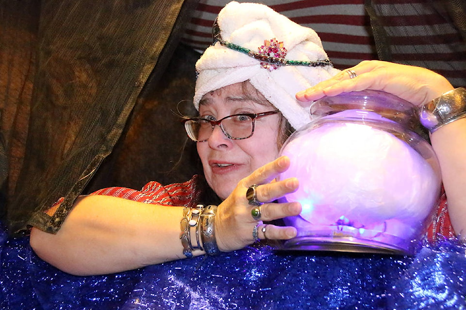 Arriving at the haunted house, you’re met by the Fortune Teller, Teresa Gustafson. (Lexi Bainas/Gazette)