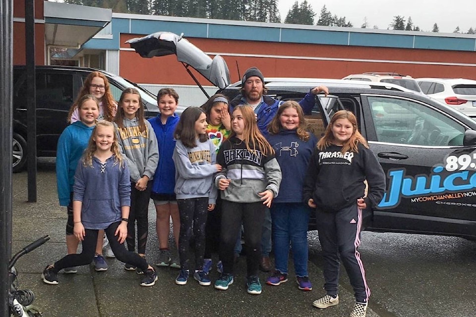 Students at Drinkwater Elementary helped Juice FM Stuff the Truck and spent the previous weeks collecting 1,388 items of food to help the local food bank. (Submitted)