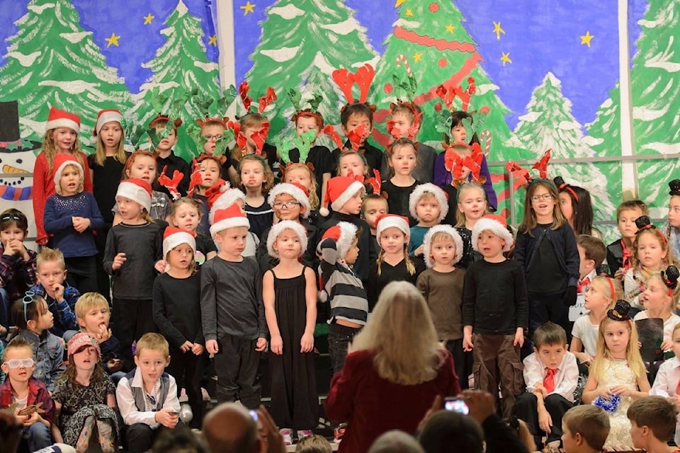 Palsson Elementary School children perform a holiday concert for an appreciative audience. (Malcolm Chalmers/Gazette)