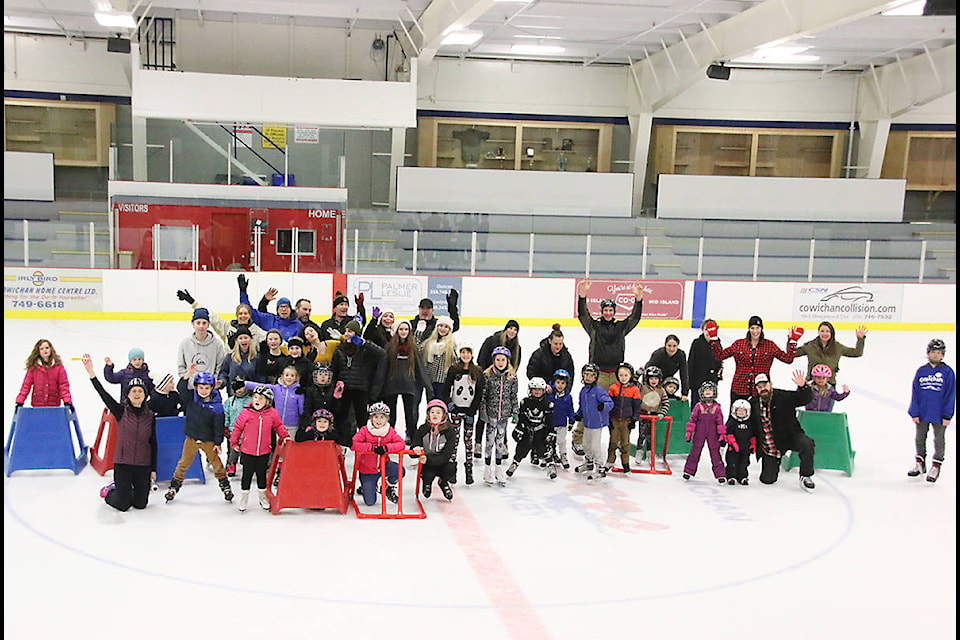 A big group of skaters at Cowichan Lake Sports Arena takes time out Dec. 31 to wish everyone a Happy New Year! (Lexi Bainas/Gazette)