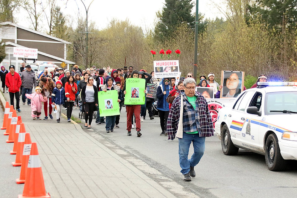 The Second Annual Walk for Missing Men, Women, and Children makes its way along College Way in Duncan on Saturday morning, April 13. (Lexi Bainas/Citizen)