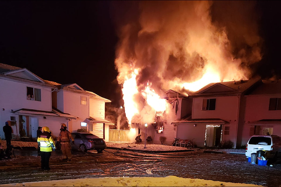 A fire destroyed several units at a housing complex on Auchinachie Road Tuesday night. (Damian Joulie photo)