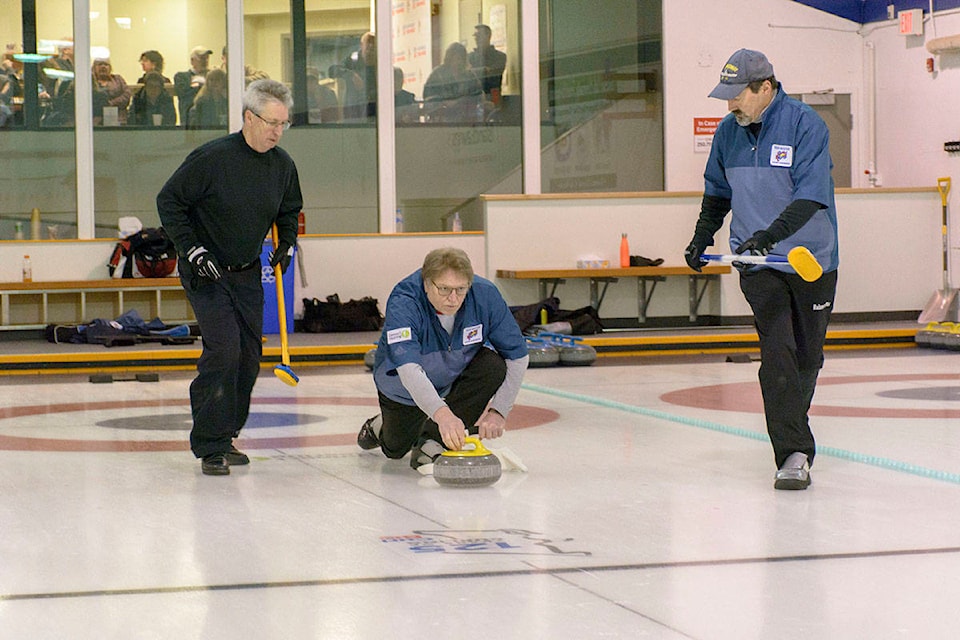 Mill Bay’s Wes Craig, skip of Team Craig, concentrates before releasing the stone during the men’s final of the 2020 Connect Hearing BC Masters Curling Championships. Games were also held at the Glen Harper Curling Centre in Duncan and the Kerry Park Curling Centre in Mill Bay (Malcolm Chalmers photo)