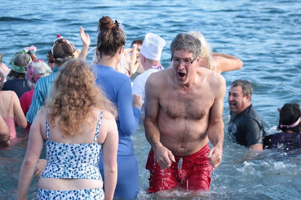 Many braved the chilly waters of Maple Bay during the annual New Year’s Day polar bear swim on Wednesday, Jan. 1, 2020. (Kevin Rothbauer/Citizen)