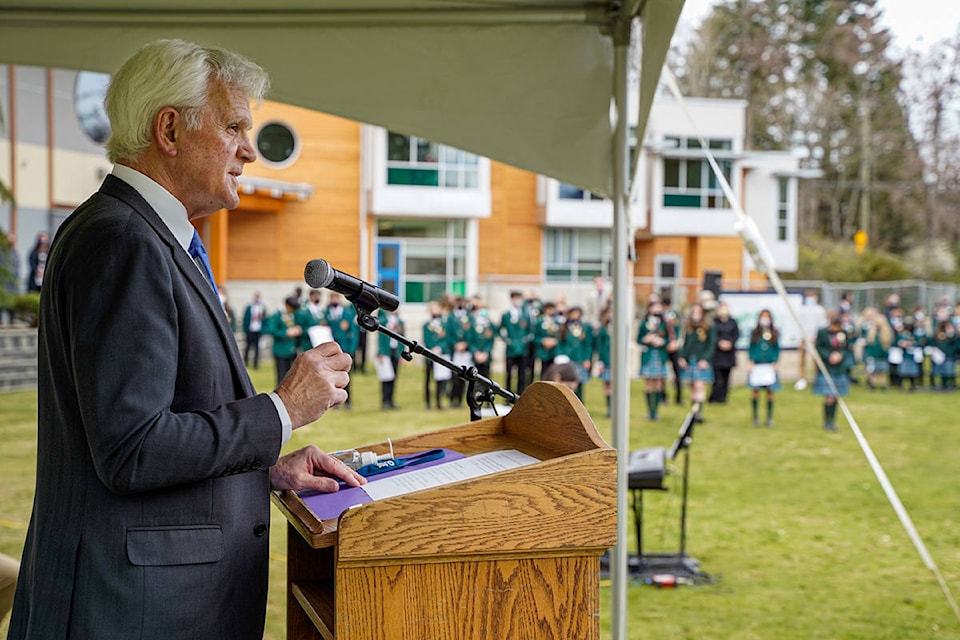 QMS Head of School, David Robertson, addresses students and staff during the school’s Centennial Founders’ Day event in 2021, a special day to honour the school’s 100th birthday. (Light Work Photography photo)