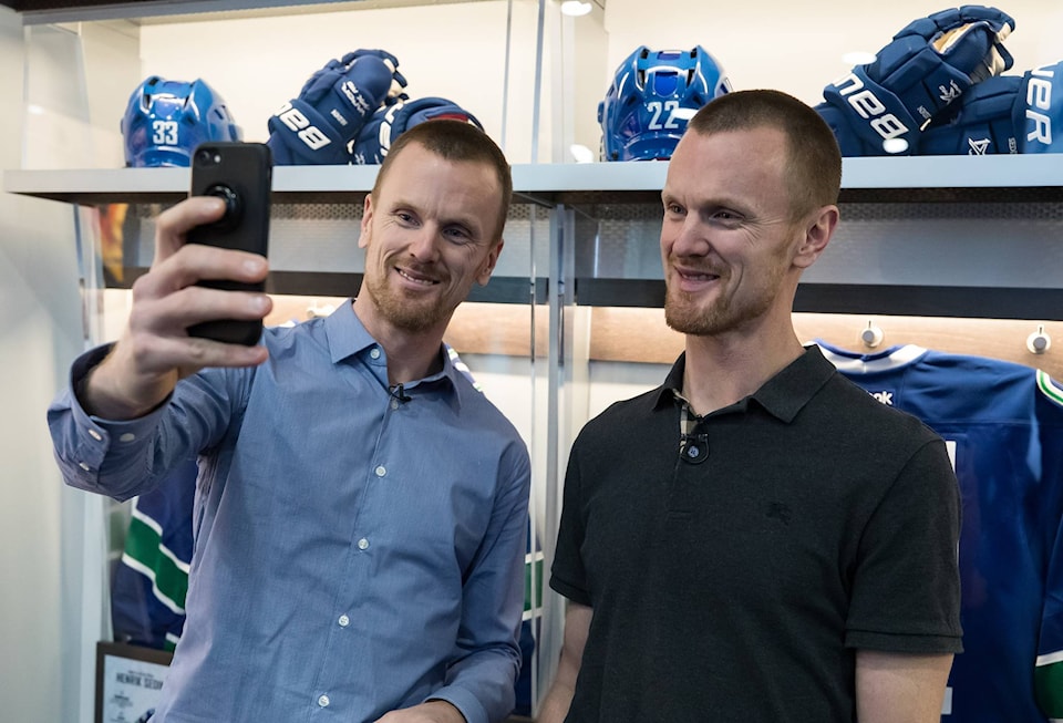 25606297_web1_210623-CPW-Sedin-twins-hockey-development-sedins_1