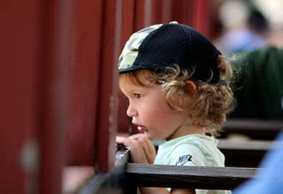 Two-year-old Charlie Snider of Brentwood Bay gazes out the window while riding on the train at the BC Forest Discovery Centre during Kids Day events on the 2021 BC Day long weekend. (Kevin Rothbauer/Citizen)
