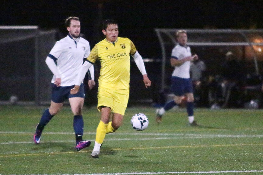 Raymond Sam scored one of Cowichan Oak FC’s three goals in a 5-3 loss to the Saanich Fusion Matadors at the Sherman Road turf last Friday night. (Kevin Rothbauer/Citizen)