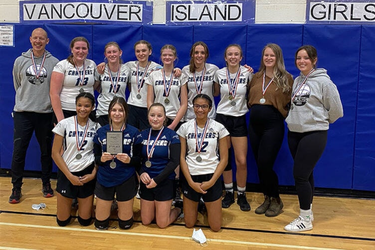 The Duncan Christian Chargers celebrate winning silver at the Island senior girls single-A volleyball championships. (Submitted by Duncan Christian School)