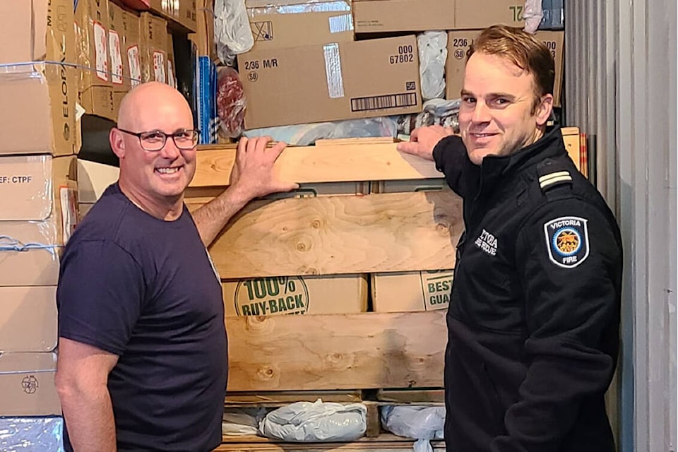 Firefighters from Esquimalt and Victoria teamed up to supply, crate and load firefighting equipment for Ukraine. (Compassionate Resource Warehouse/Facebook)