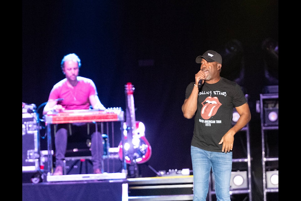 Right, Saturday night headliner Darius Rucker performs for a big crowd at Sunfest 2022.