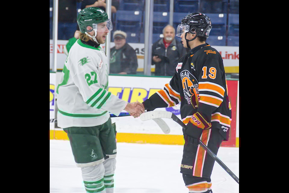 Cranbrook Bucks captain Bryce Sookro shakes hands with Trail Smoke Eaters forward Jason Stefanek. Trevor Crawley photo.