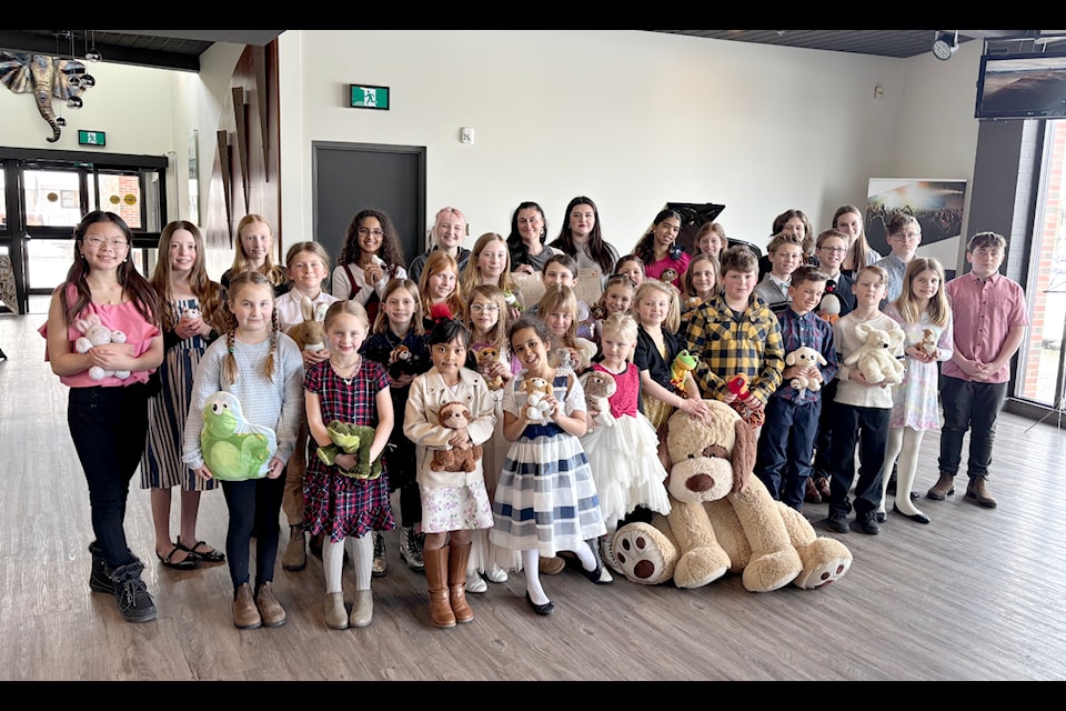 Student performers and SPCA representatives at the EKMTA's Fur, Feathers and Friends concert for the SPCA, Feb. 23 at the Key City Theatre.