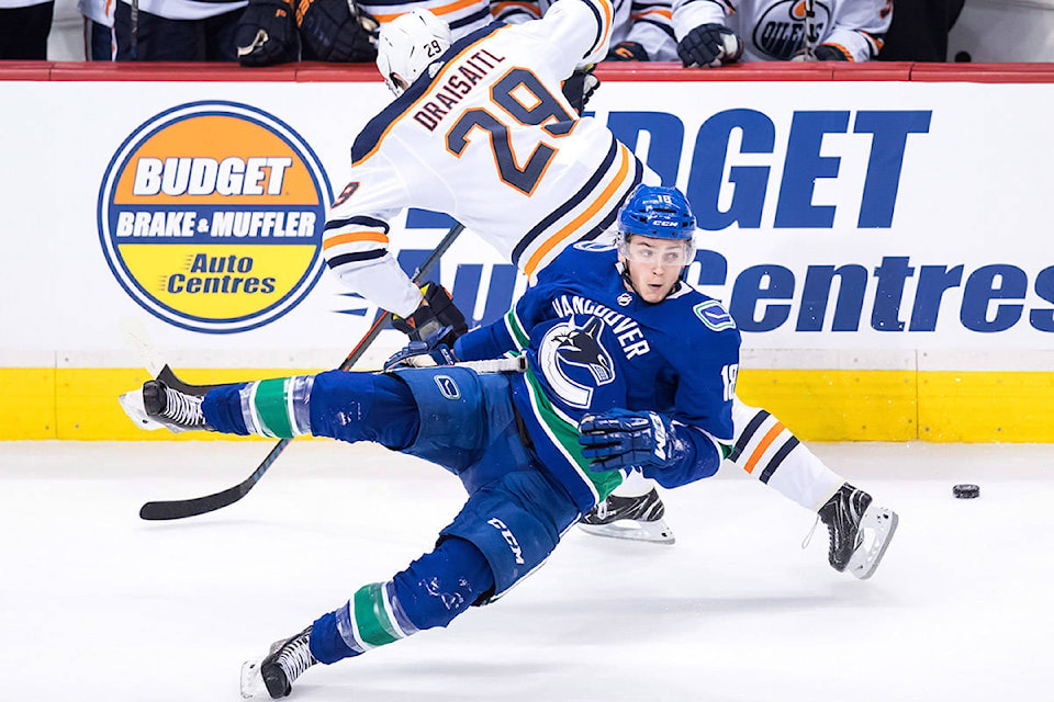 14815591_web1_181216-IFD-Canucks-Oilers2