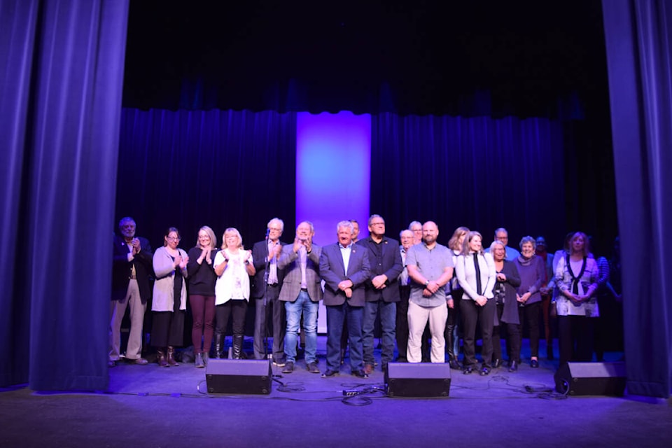 Donors and supports of Key City Theatre are pictured on stage as the curtains were pulled back for the first time, in front of an audience, since being replaced. Key City held a gala and concert on Tuesday, March 29 to mark the occasion. (Corey Bullock/Cranbrook Townsman file)