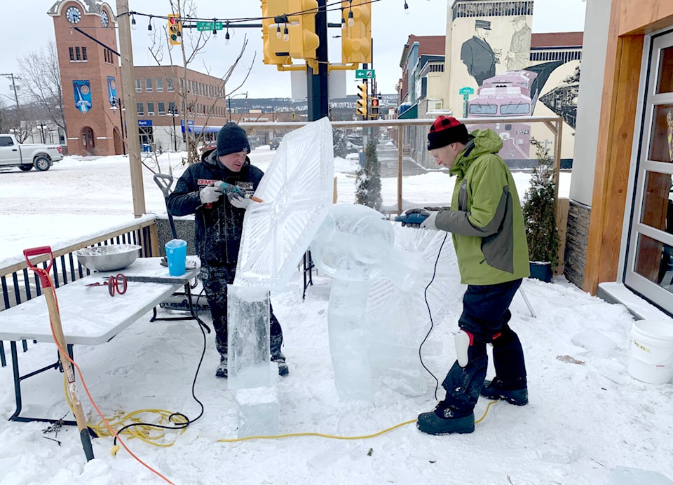 31937349_web1_230223-CDT-ice-carving-1_1
