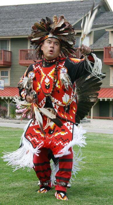 Lower Kootenay Band Nasukin Jason Louie demonstrates a traditional dance in full regalia. (Black Press file photo)