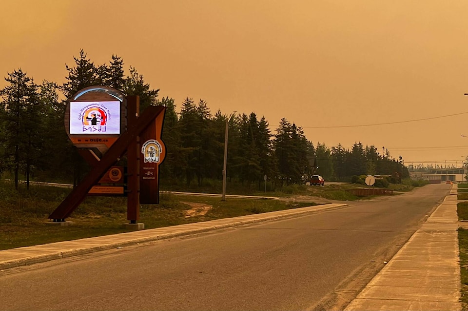 33218140_web1_230612-CPW-Quebec-fire-evacuees-returning-smoke_1