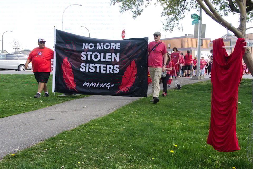 On May 3, residents marched to raise awareness for missing and murdered Indigenous people to mark Red Dress Day. Trevor Crawley photo.