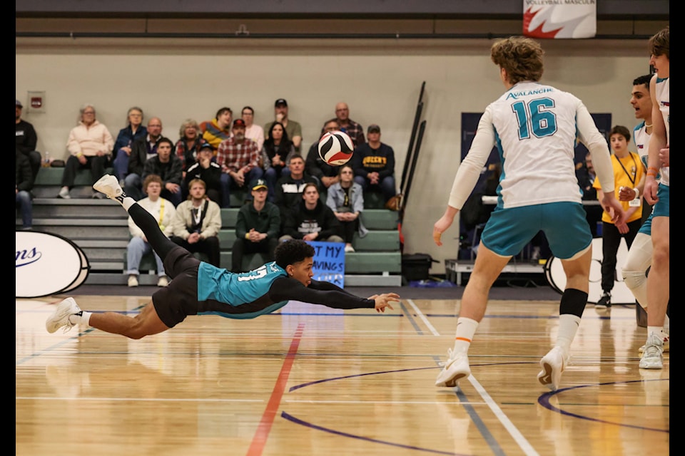 Libero Reece Clarke goes all in for the dig during the CCAA Nationals Bronze medal match against the Dragons de Sainte Anne, Saturday, March 8. (Photo courtesy CCAA)