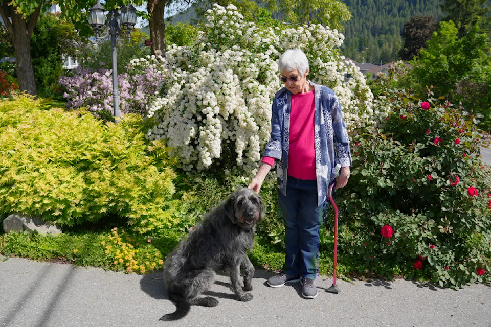 Gertie Brown poses with her dog Maggie. 
