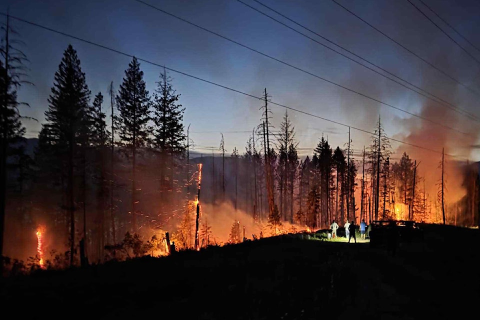 A wildfire was burning out of control on the East Shore of Kootenay Lake, June 10. 