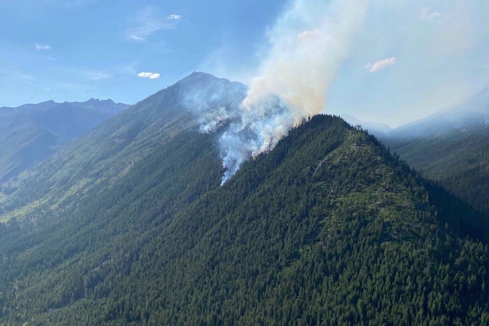 A wildfire at Woodbury Creek is seen on Sunday. Photo: B.C. Wildfire Service