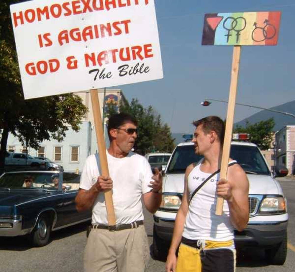 A Christian protester speaks with a Pride participant at the Nelson parade in 2003. Photo courtesy Touchstones Nelson LGBTQ2S+ Archives