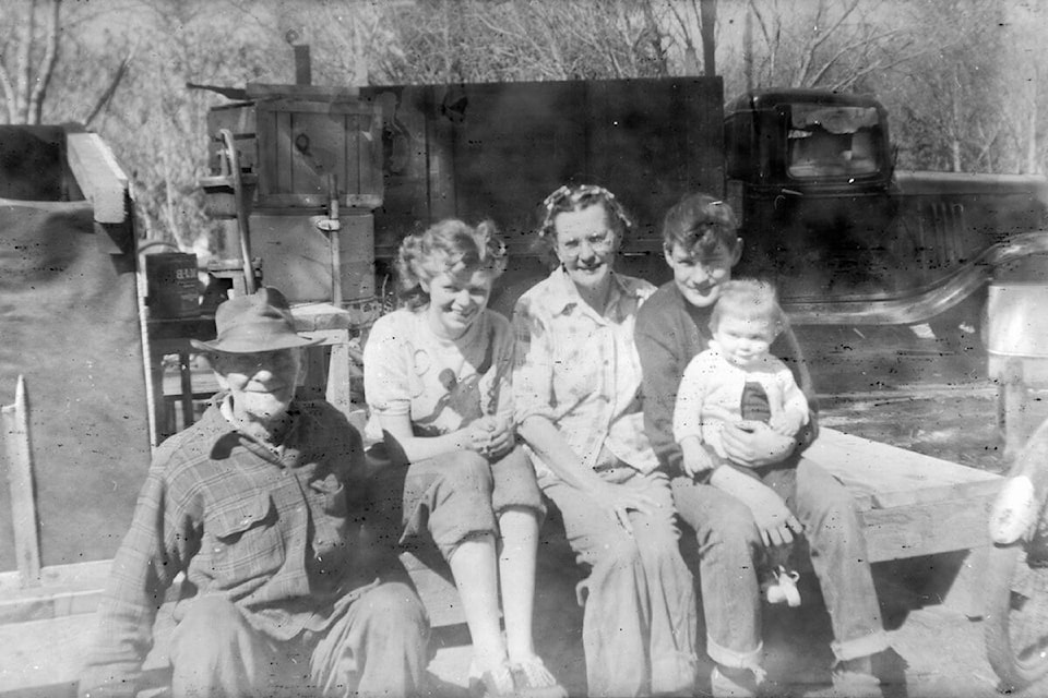 Left to right: Carl Johan Pedersen, Lorraine Provan’s great grandfather, Pauline Hjerdis Carlsen Provan, Lorraine Provan’s mother also wearing the Olympics sweater, Gertina Carlsen, Lorraine Provan’s grandmother, Johnny Selmar Carlsen, Lorraine Provan’s uncle holding Lorraine Provan, Pamela Bonar’s grandmother. (Contributed photo)