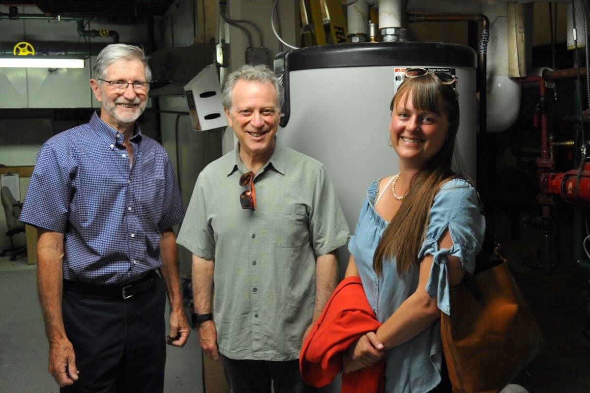 L-R: Nelson Mayor John Dooley, Environment Minister George Heyman and Nelson-Creston MLA Brittny Anderson tour the antiquated furnace room of the Civic Centre. Work aimed at cutting down the buildings greenhouse gasses will begin in 2023. Photo: Tyler Harper