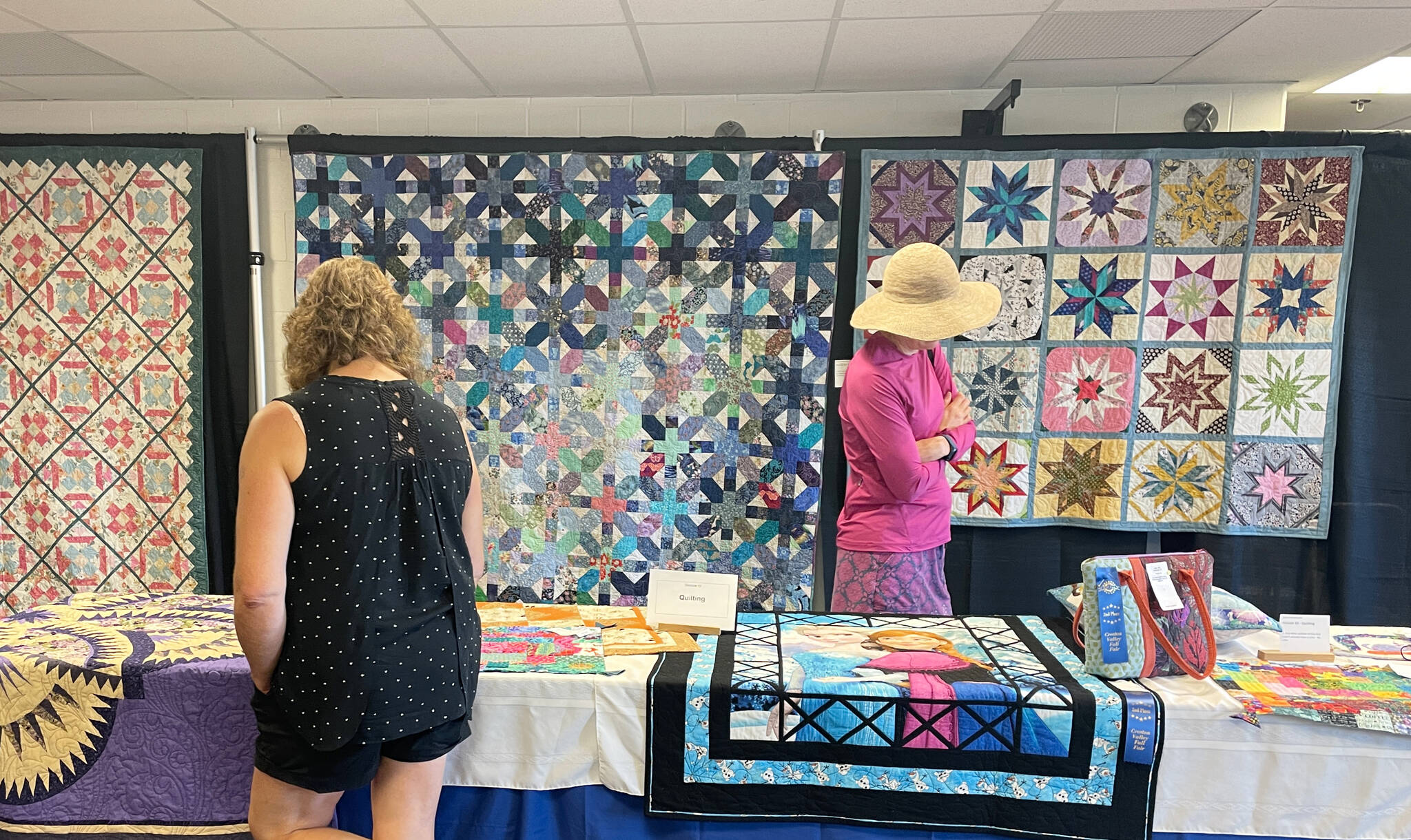 Amazing needlework, quilts, and cross stitched pieces were on display. (Photo by Kelsey Yates)