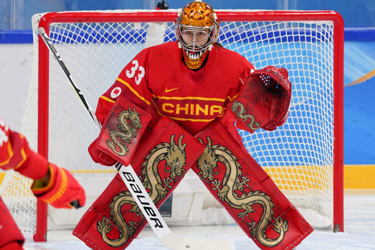 British Columbias Kimberly Newell, in her distinctive pads and helmet, was a star in net for Team China at the Beijing Games. (Photo: Submitted)