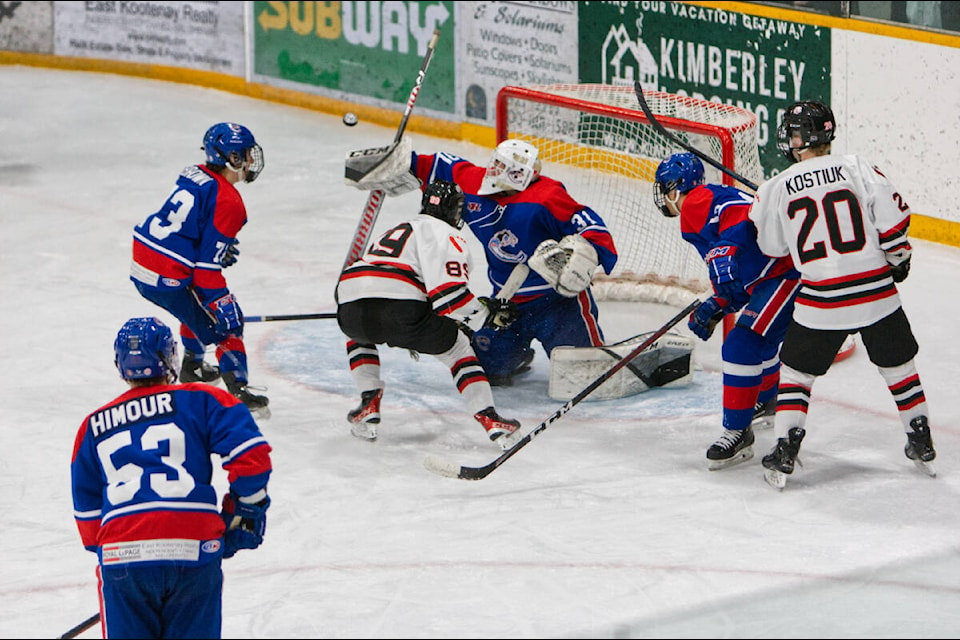 Creston Valley Thunder Cats goalie blocks a shot, one of his 47 saves that catapulted his team to victory. Paul Rodgers photo.