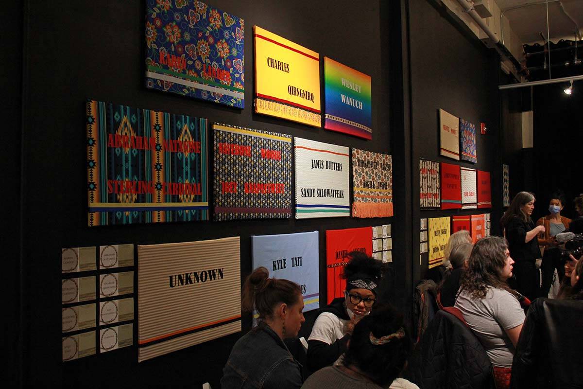 A few dozen people gathered at the Gallery Gachet in Vancouver on March 15, 2022 to mark the International Day Against Police Brutality. The gallery is lined in art pieces with the names of people who have died in incidents of police violence. (Jane Skrypnek/Black Press Media)