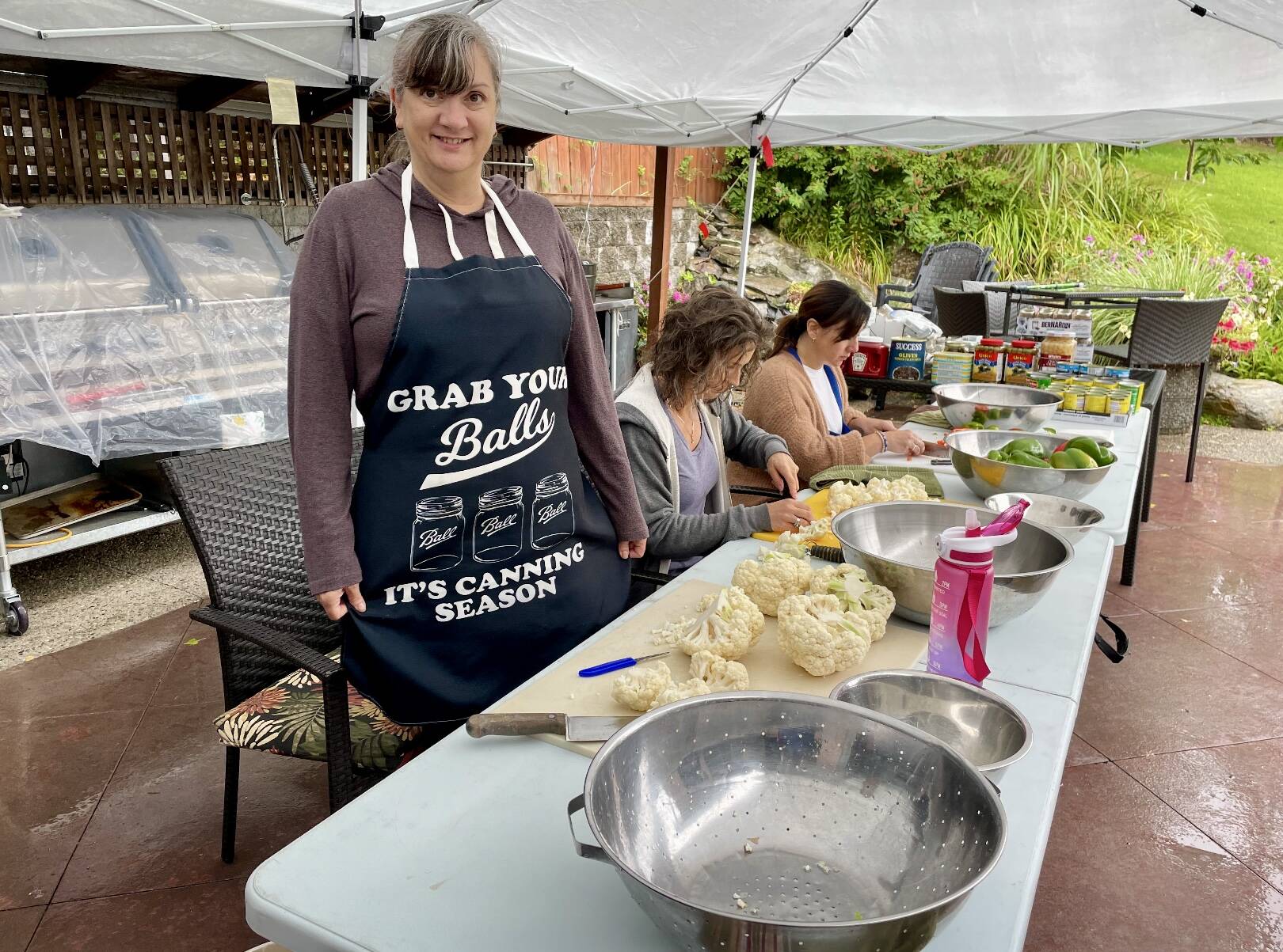 Lana Rodlie and her daughters Tina Kenyon, Jamie Santano and Olea Taboulchanas get together each summer to make and share the load. Photo: Submitted