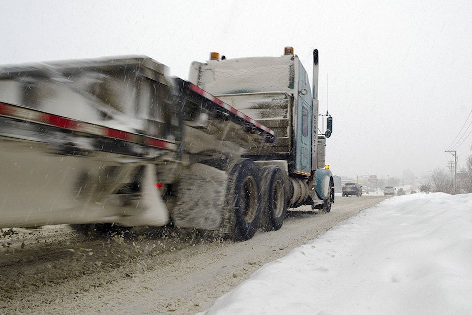 10024716_web1_171228-SAA-Semi-on-snowy-highway